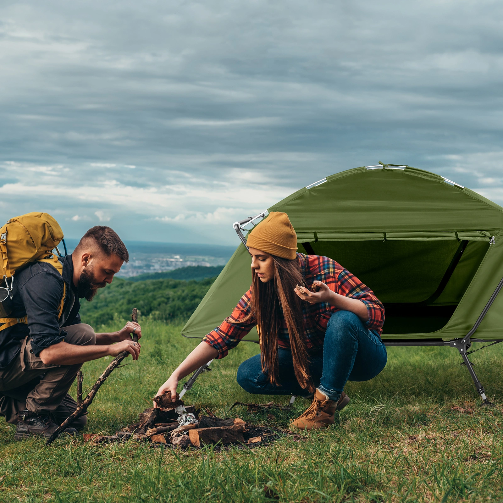 Collapsible camping tent with an integrated cot view 22